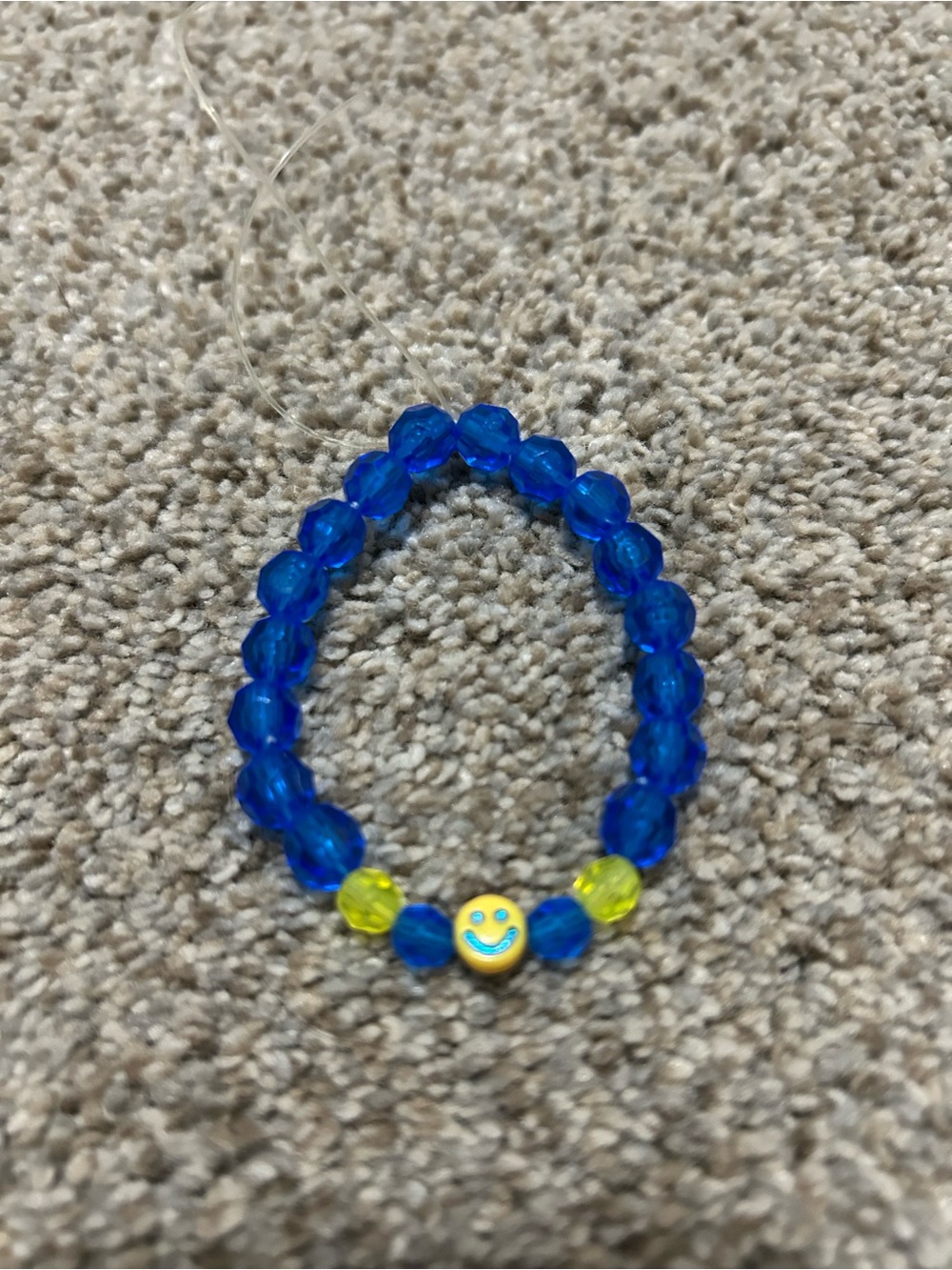 Kids Blue Beaded Stretch Bracelet with Yellow Smiley Charm